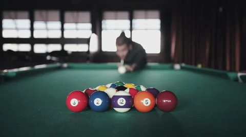 Man playing pool billiards first shot Stock Footage 56824147