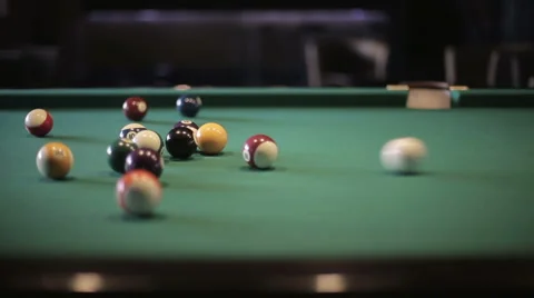 Man playing pool billiards first shot. Slider camera movement Stock Footage 56824777