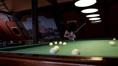Man playing pool, billiards Stock Footage 61935493