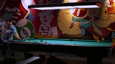 Man playing pool, missing ball in the hole Video stock 58627962
