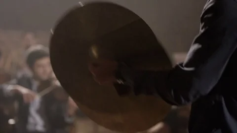 Man playing on ride cymbal on the symphony hall . Stock Footage