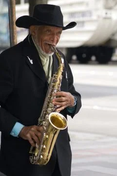 Man playing sax Stock Photos