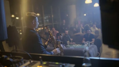 Man is playing a saxophone close-up Stock Footage 76556811