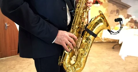 Man playing the saxophone close-up Stock Footage 103099995