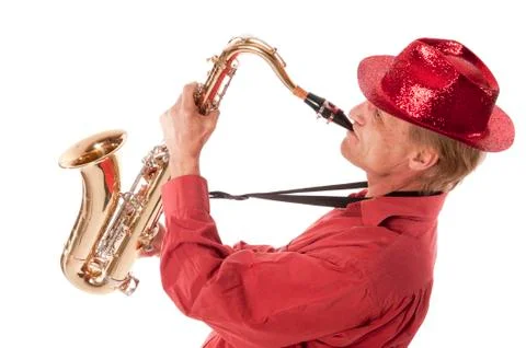 Man playing saxophone with devotion Stock Photos