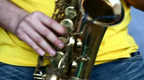 A man playing on saxophone Stock Footage 11022838