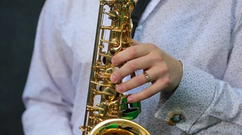 A man playing the saxophone Stock Footage 64582385