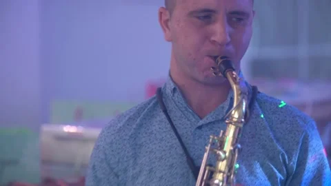 A man playing the saxophone Stock Footage 143586954