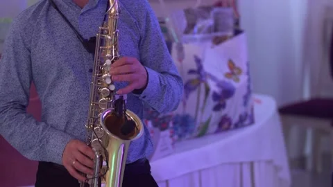 A man playing the saxophone Stock Footage 143690717
