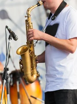 Man playing with saxophone Stock Photos