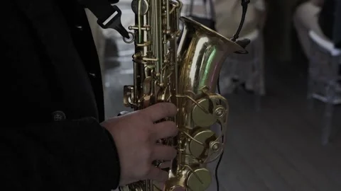 A man playing the saxophone, slow motion video, close-up Stock Footage 328314714
