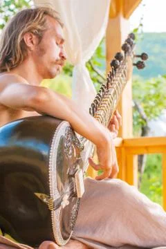 Man playing on sitar Stock Photos