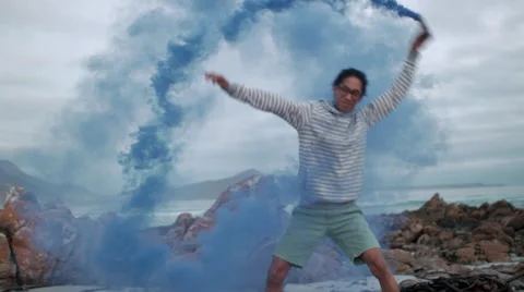 Man playing with smoke Video stock 64563878