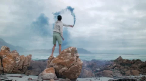 Man playing with smoke Stock Footage 64563942