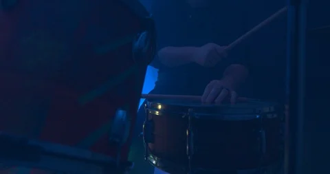 Man Playing on the Snare Drum at a Rock Concert Stock Footage 98953533