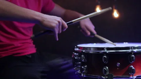 Man playing on snare with drumsticks. Stock Footage