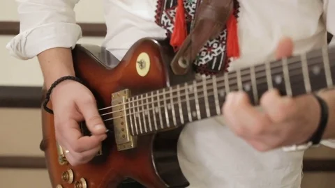 Man playing solo guitar (HD Stock Footage 74730968