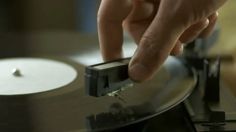 Man playing songs on a record player 動画素材 67115294