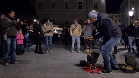 Man playing with a string puppet Stock Footage 100989971