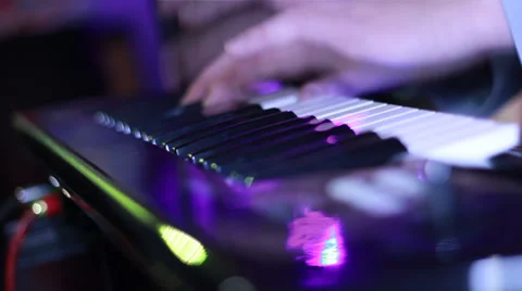 Man playing on synthesizer Stock Footage 58164855