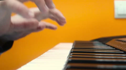 Man playing synthesizer Stock Footage 60744356