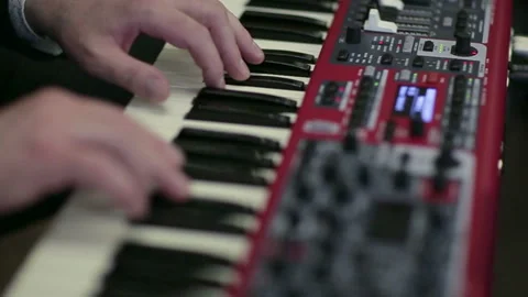 Man playing synthesizer Stock Footage 97922822