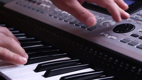 Man playing synthesizer Stock Footage 265199476