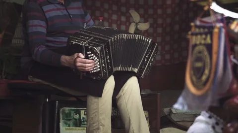 Man playing tango with accordion Stock Footage 127488098