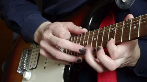 Man playing tapping on guitar Stock Footage 76001502