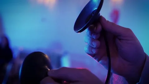 Man playing on Tingsha Stock Footage 73240621