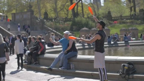 Man playing trick in park Stock Footage 114246823