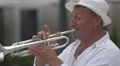 Man playing a trumpet with passion in Porto 4k or 4k+ Resolution