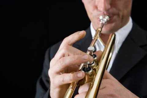 Man playing a trumpet Stock Photos
