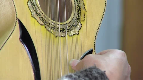 A Man Playing A Typical Chilean Stringed Instrument Called "Chilean Guitarron". Stock Footage 266305421