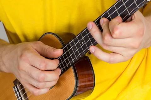 Man playing ukulele Stock Photos