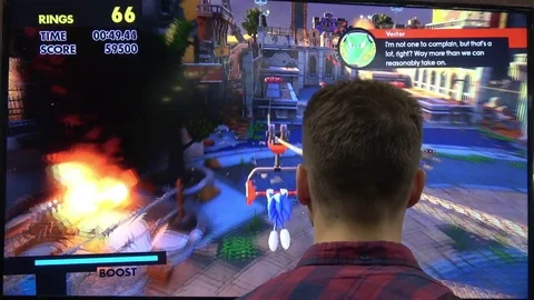 Man playing video computer game on IGROMIR (Games World) and Comic Con Russia Stock Footage 81513084