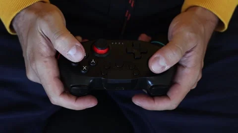 Man playing video game on gamepad. Stock Footage 252324444
