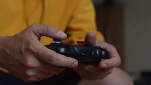 Man playing video game on gamepad. Stock-Footage 252325044