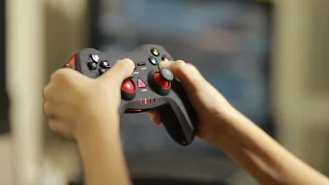 Man playing video game with a joystick. close-up of children's hands Stock Footage 71460812