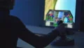 The man playing in video game with a joystick. evening night time 4k or 4k+ Resolution