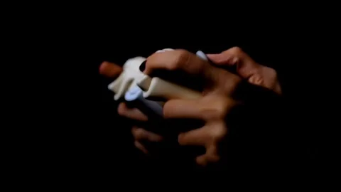A man playing a video game with a joystick. Close up of children's hands Stock-Footage 334653468