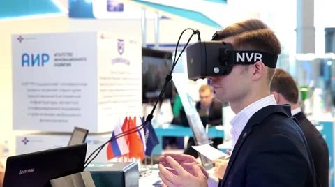 Man playing with virtual reality glasses in virtual reality game Stock Footage 58968195