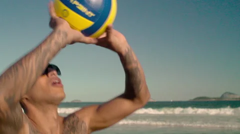 Man playing volleyball on Ipanema beach Stock-Footage 59377553