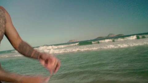Man playing volleyball on Ipanema beach Stock Footage 59377555