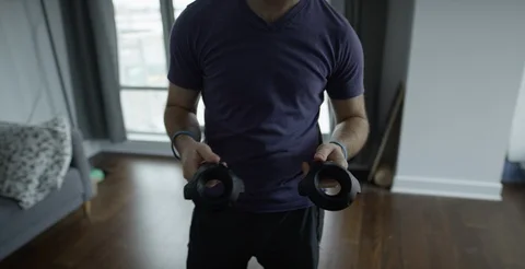 Man playing vr takes off headset Stock Footage 106848907