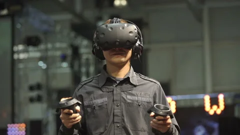 Man playing VR video game Stock Footage 88616284
