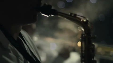 Man playing wind instruments Stockbeeldmateriaal 59864174