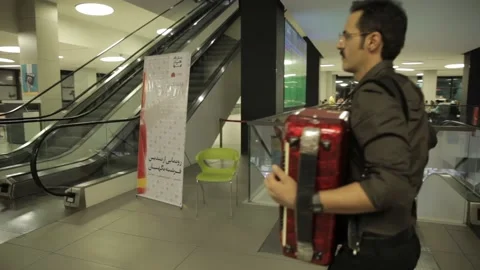 A man plays accordion 動画素材 145468638