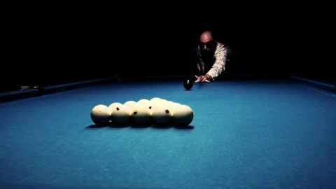 Man plays billiards. blue table. man with glasses Stock Footage 94733924