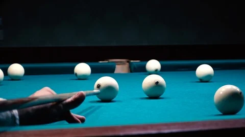 Man plays billiards makes a punch and misses Stock Footage 95998311